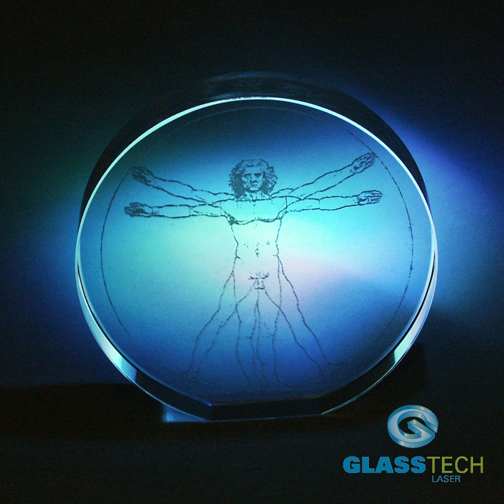Vitruvian  laserovaný ve skleněném těžítku